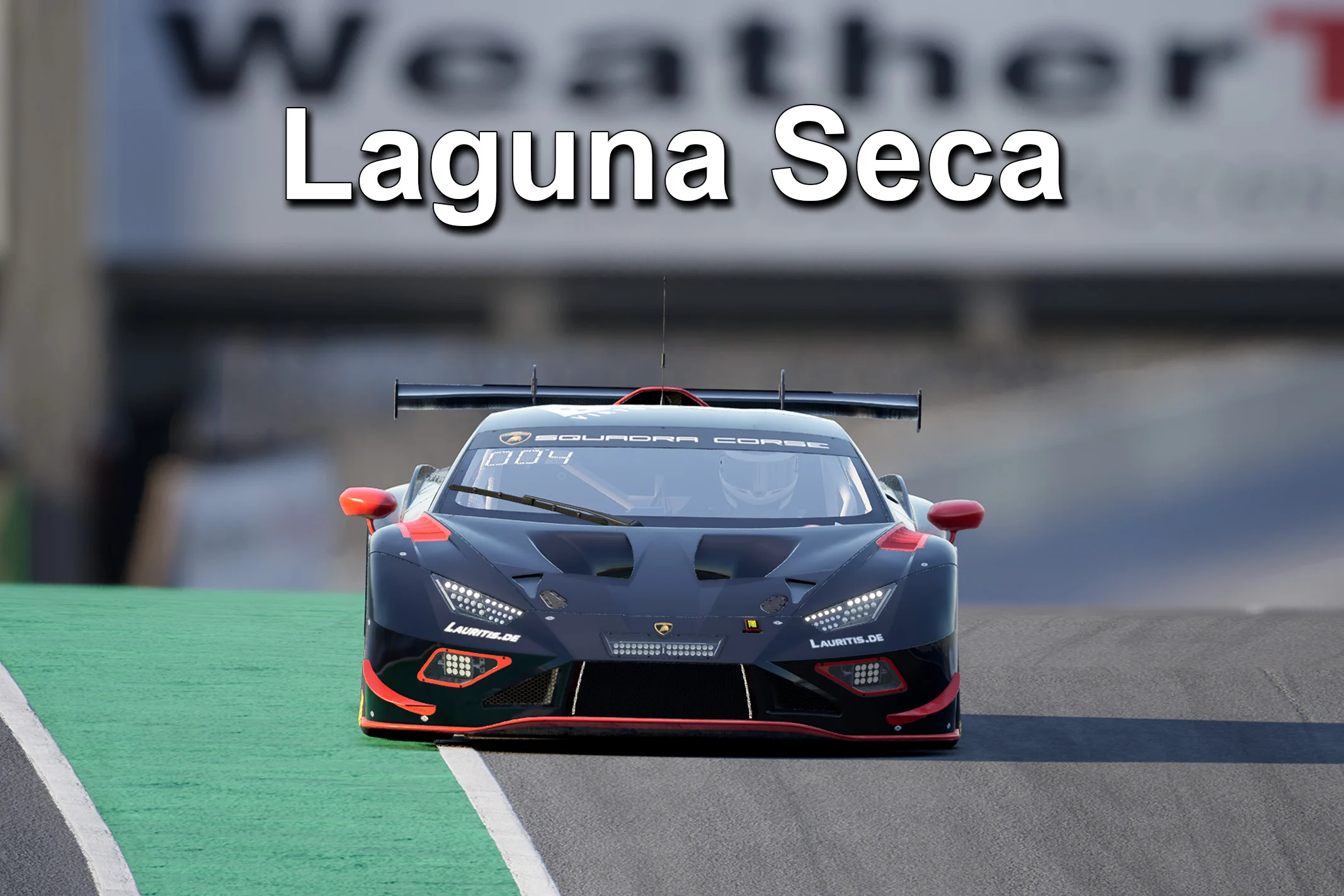 Front View of a Dark Blue Lamborghini Race Car with Red Accents on a Race Track Laguna Seca Banner Blurred in the Background