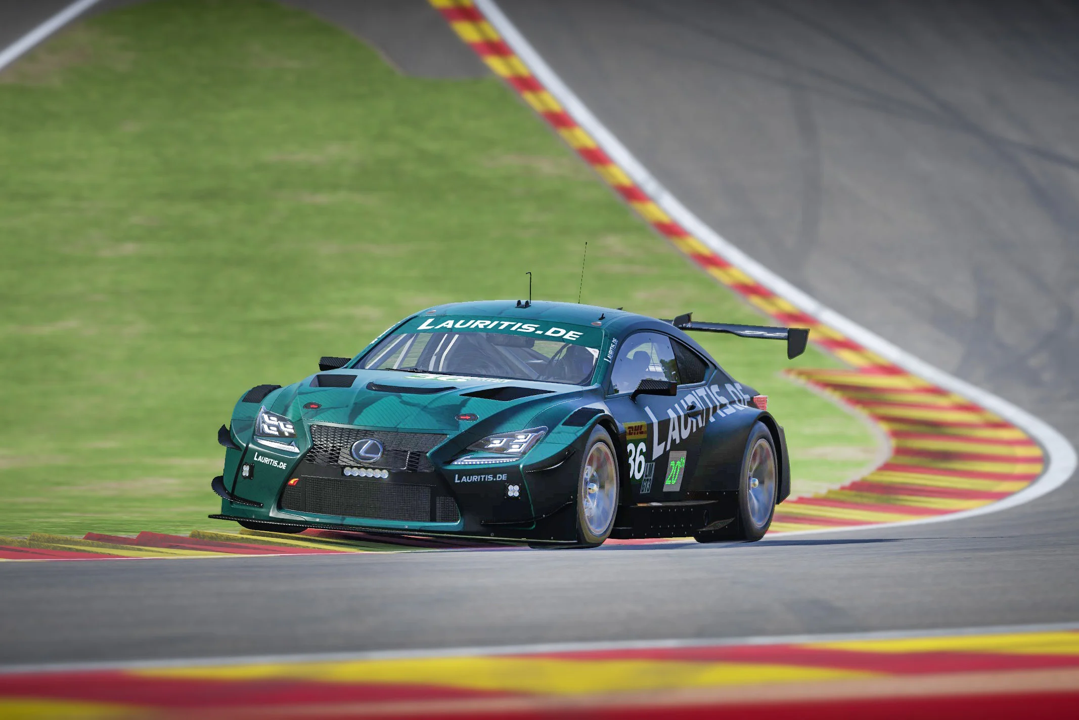 Racing Car in Teal on a Curving Track Sponsor Decals Visible Approaching a Striped Redyellow Curb Edge on a Sunny Day